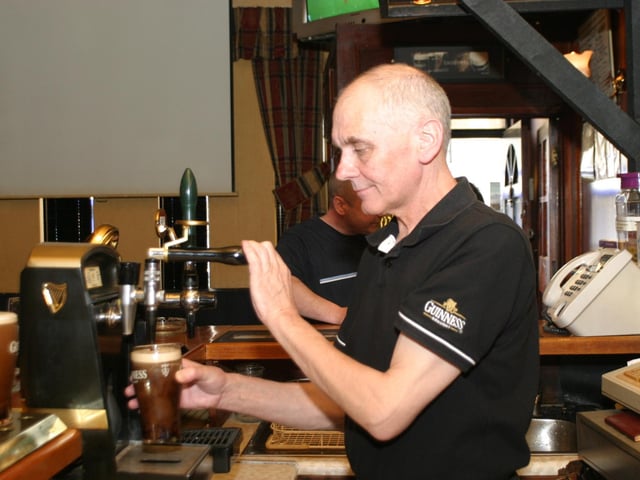 Serving up a perfect pint of stout in the Alleyman's.