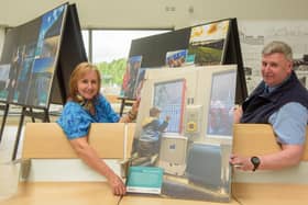 Derek McDermott, Translink Customer Service Co-ordinator at the North West Transport Hub with photography competition award winner Breige Young with the image of her grandson waving good bye.