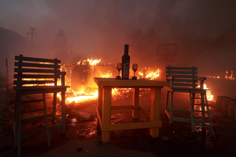 Malibu, California January 8, 2025-Rosenthal Wine Tasting goes up in flames along PCH as the Palisades Fire in Malibu Tuesday. (Wally Skalij/Los Angeles Times via Getty Images)