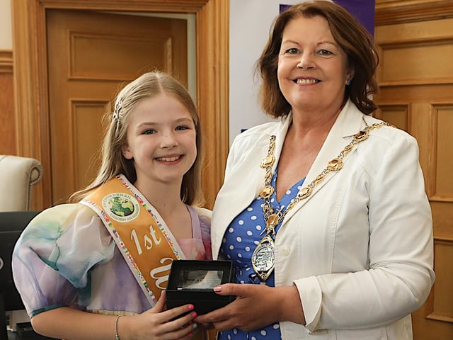 Mayor Patricia Logue presents a gift to Eibhlin McCallion, World Champion Irish Dancer. (Photo - Tom Heaney, nwpresspics)