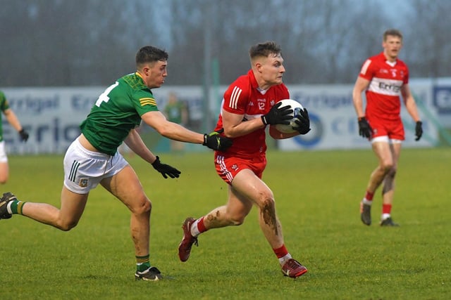 Derry’s Ethan Doherty holds off Meath’s Harry O’Higgins during their Allianz Football League game at Owenbeg on Saturday. Photo: George Sweeney. DER2308GS – 57