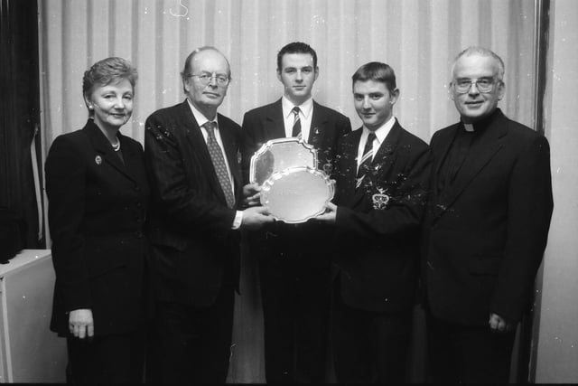 Professor Lord Smith, guest speaker at the St. Columb's College prize-giving, second from left, presenting the Monsignor Coulter Award for Mathematics and Science to Myles McLaughlin and the Monsignor Coulter Award for Humanities to Iain Ferguson. Included are Lady Julia Smith and the Very. Rev. John Walsh, College President.