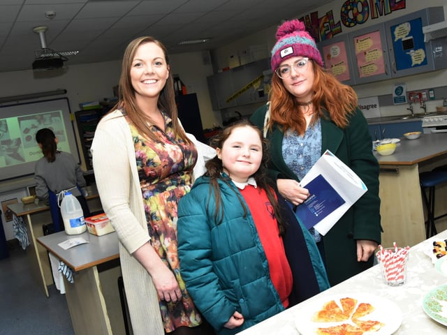 Lisnagelvin Primary School Pupil, Ella Rose, with her mum Saorla pictured with Home Economics teacher Miss Devine at Oakgrove College Open Day on Thursday.