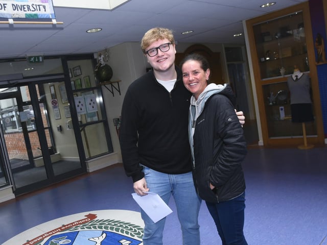 Troy Grey pictured with Oakgrove College staff member Michelle McColgan on A Level Results Day
