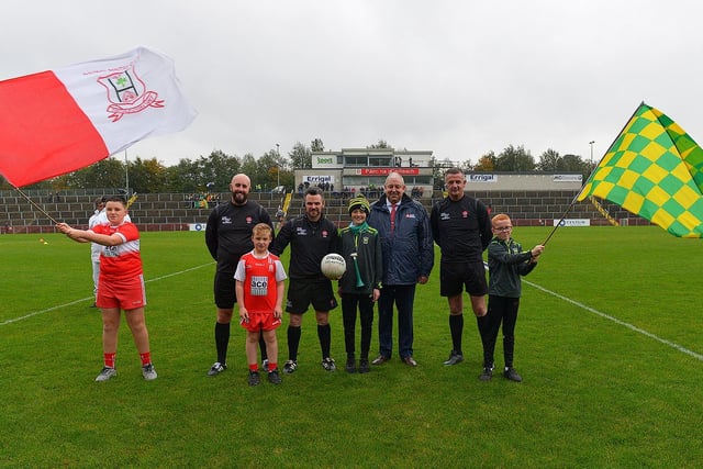Young footballers from Drumsurn and Glenullin presented the match ball to referee Richie Donoghue prior to the IFC final in Celtic Park on Sunday afternoon last as part of the GAA’s Referee Respect Day Included in the picture is Derry County chairman John Keenan.  Photo: George Sweeney.  DER2243GS – 026