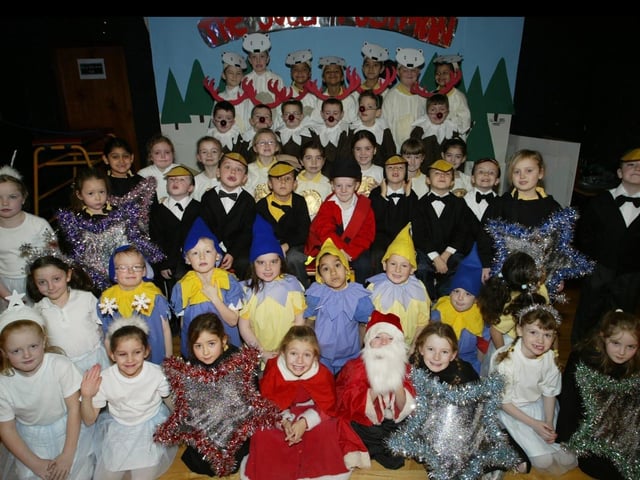 Model PS pupils who are appearing in the sshools nativity play "The Jolly Postman". (09012JB07):Derry nativities and Christmas shows from December 2003