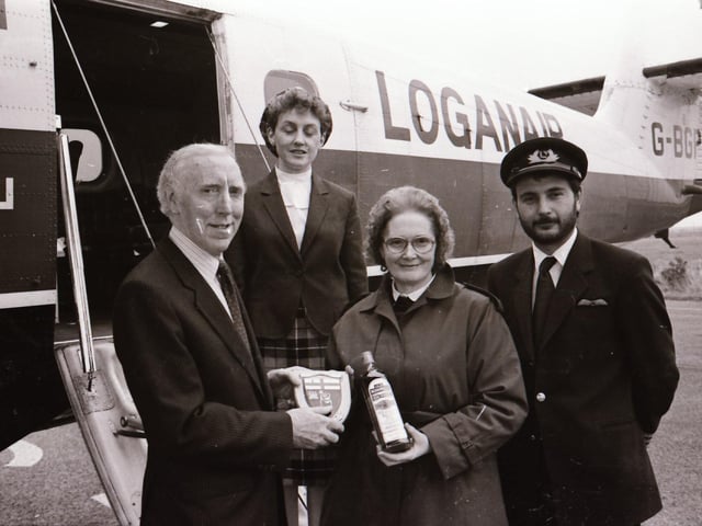 Presentation to 10,000th passenger passing through Eglinton Airport.