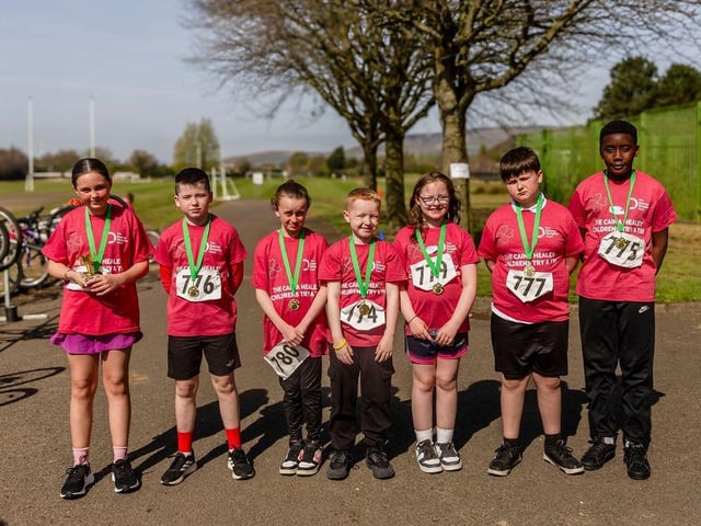 Medal time at the Caina Healey Children's Try-a-Tri, a special event organised by the Bogside and Brandywell Health Forum in partnership with the Danny Quigley Fund.