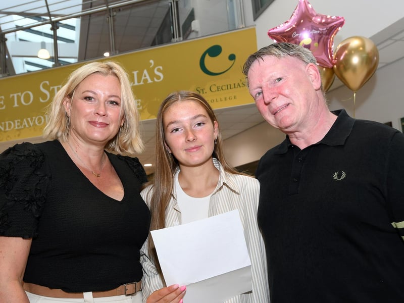 Erin Barber pictured with her parents Juliette and Peter when she collected her 'A' Level results at St. Cecilia's College.