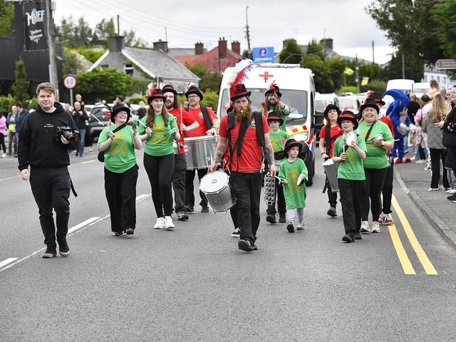 Muff Feile opening parade makes its way through the village on Friday evening. Photo: George Sweeney