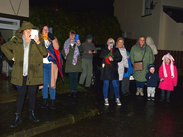 People gather to greet Santa at the Creggan Community Collective, Cromore Gardens, on Friday evening last. DER2249GS – 29