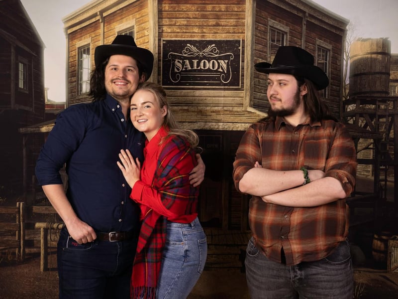 Luke de Belder and Caitlyn Kelly as Curly and Laurey with Matthew Irwin as Jud Fry in LMS' production of Oklahoma.