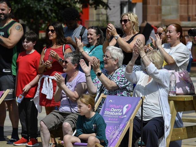 Spectators at an IYSC Youth Circus performance in Guildhall Square during the Carnival of Colours Festival. Photo: George Sweeney