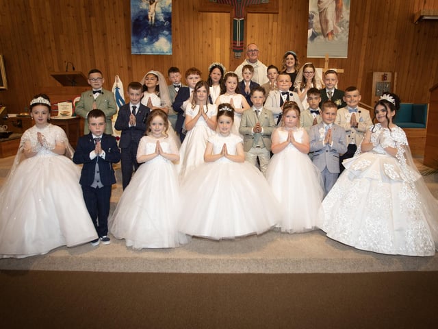 Pupils from Steelstown Primary School who received the Sacrament of First Holy Communion from Fr. McDevitt at Our Lady of Lourdes Church, Steelstown on Saturday last. (Photo: Jim McCafferty Photography)