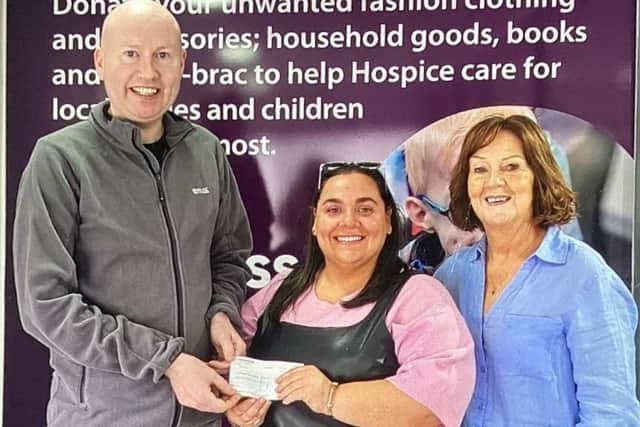 Grainne Semple donating the proceeds of funds raised through “donations instead of flowers” at her father’s funeral to Chris and Didi’s sister Teresa from the Northern Ireland Children’s Hospice.