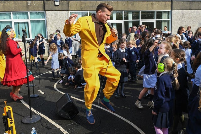 Ian Clarkson of the Jive Aces performing at Rosemount Primary School on Thursday morning. Photo: George Sweeney
