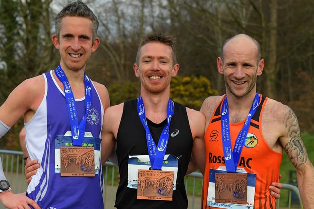 Race winner Timothy Johnston (centre) Annadale Strikers, second place Foyle Valley’s Scott Rankin (left) and Shane O’Donnell, Rosses AC who finish third. Photo: George Sweeney