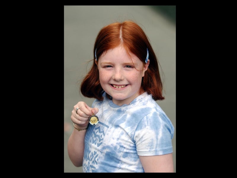 Saorla Boyle, from Glenvale Road, a pupil of St. Eugene's Primary School, winner of the Irish Poem P.6. (2504C22)
