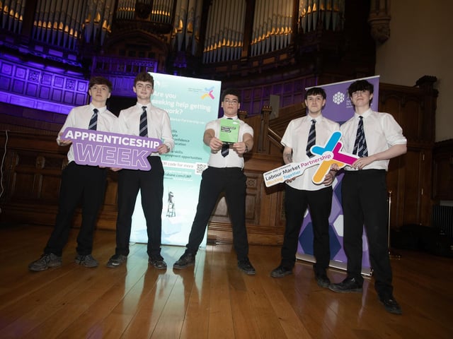 Students from St. Columb's College help promote Thursday's Apprenticeship Fair at the Guildhall, Derry.