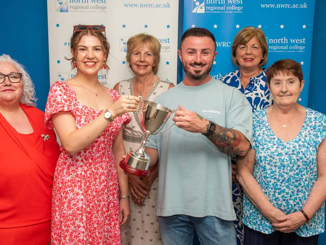 Emmett Gallagher is presented with the Gerard Finnegan Memorial Cup by Dervla and Maire Finnegan. Also pictured is: Violet Toland, Quality Enhancement Curriculum Lead for Higher Education at NWRC, Dr. Catherine O'Mullan, Director of Curriculum and Academic Standards at NWRC, and Roisin Gallagher, Emmett's mum. (Photo: NWRC)