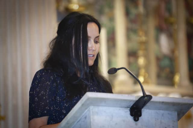Irish singer-songwriter Andrea Corr addressing the attendance at Tuesday night’s Sister Clare Retreat in the Long Tower Church, Derry.
