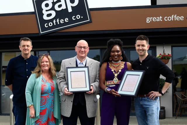 Colr. Terry  Crossan , Leas Cathaoirleach Inishowen Municipal District, and Colr. Lilian Seenoi-Barr , Mayor of Derry City and Strabane, publicly endorse the  North-West Anti-Racism Charter at The Gap Coffee Company, Bridgend, on Friday. Included in the photo are, from left, Conor Sharkey, NW Migrants Forum, Maeve McLaughlin, director, Bloody Sunday Trust, and Niall Cusack, proprietor of The Gap Coffee Company.  Photo: George Sweeney