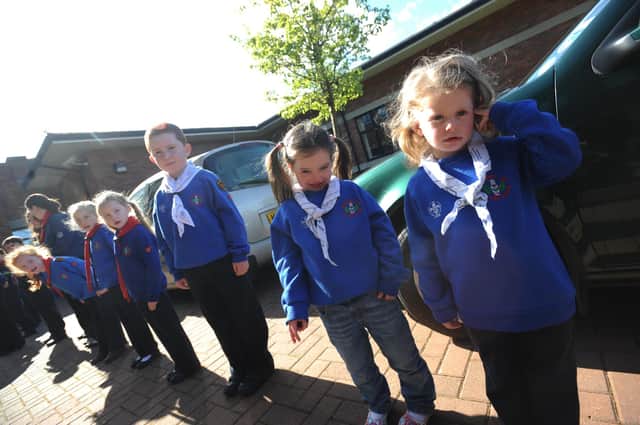 2012: Scouts from St Eugene's and St Mary's, Creggan form a guard of honour at Cardinal Sean Brady's visit to the Derry Diocesan Eucharistic conference at Thornhill. (1604SL22)
