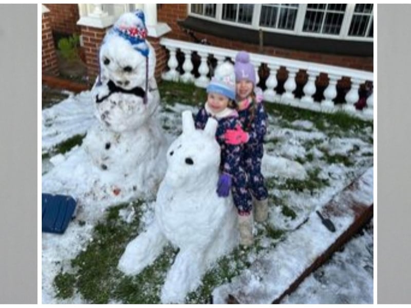 Here we have Lexi and Bobbi with their brilliant snowman and snow dog. Photo: Jemma Lynch.