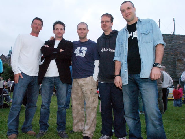 The Wild Ones prespare to go on stage. Included, from left, Ted Lynch, Kevin O'Kane, Brian McCafferty, Dee Jenkins, and Chris Harte. (1608PG72) : Pictured  are families, festival goers and artists at the Gasyard Féile back in August 2005.
