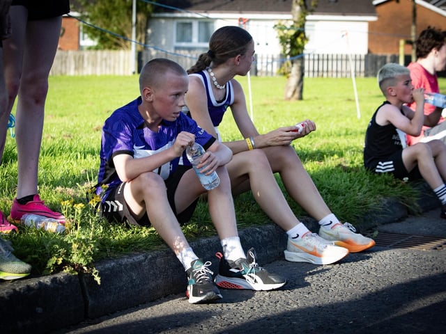 Two of the young runners take im some water at the end of Friday's Galliagh Feile 5k. (Photos: JIm McCafferty Photography)