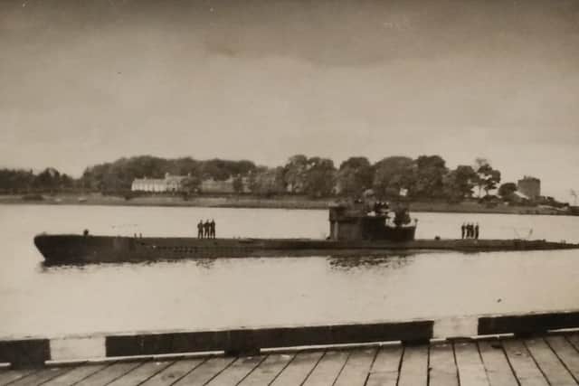 A surrendering U-boat passing Culmore in May 1945.