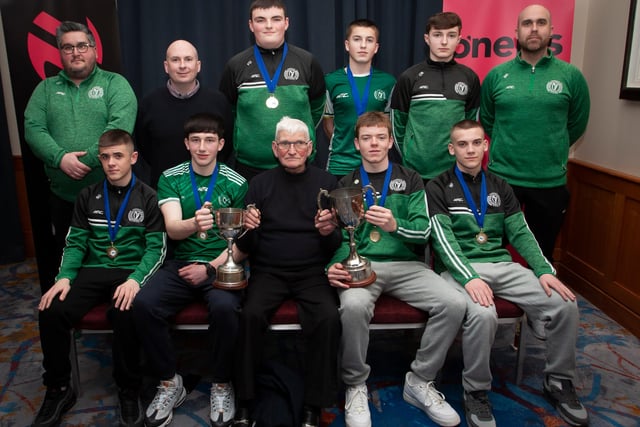 John ‘Jobby’ Crossan presenting the Under 16 Summer Cup and Winter Cup to Foyle Harps FC at the Annual Awards in the City Hotel on Friday night last. Included are coaches Dan Dunne, Sean Roddy and John Porter.