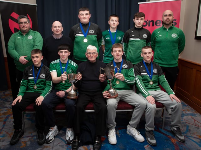 John ‘Jobby’ Crossan presenting the Under 16 Summer Cup and Winter Cup to Foyle Harps FC at the Annual Awards in the City Hotel on Friday night last. Included are coaches Dan Dunne, Sean Roddy and John Porter.