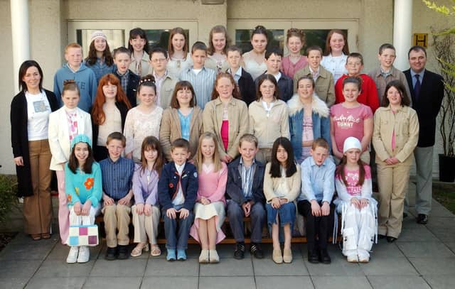 Pupils from Holybush Primary School, Culmore, who were confirmed by Most Rev. Dr. Francis Lagan, Auxiliary Bishop of Derry, in Thornhill Chapel. Included are Miss Leona McWilliams and Mr. Fergal Friel, teachers.