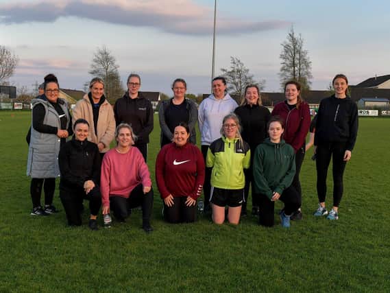Some of the participants who took part in Doire Trasna’s first Mothers and Others football practice session, at Corrody Road. Photo: George Sweeney.  DER2316GS – 07