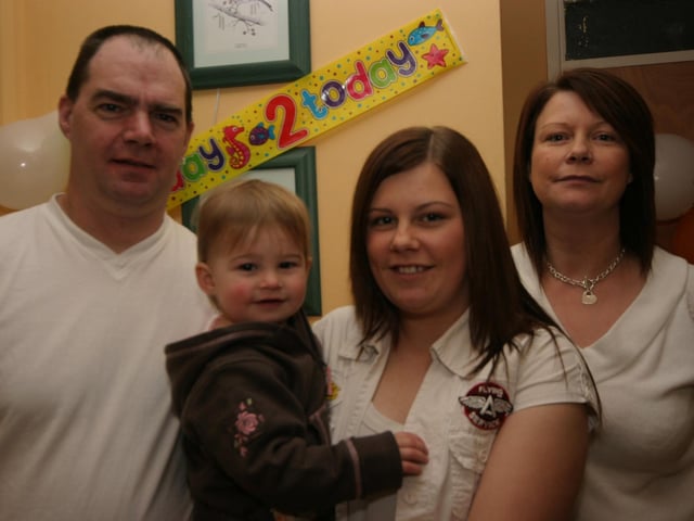 Leah pictured with her mum Kellyand grandparents, Georgina and Chris 0011/JML : Parties and celebrations January 2006: Leah McCallion.