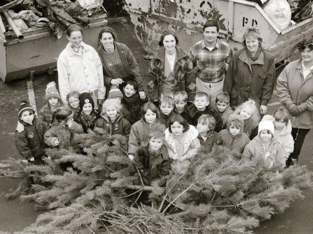 Belmont House School staff and pupils recycling their Christmas tree.