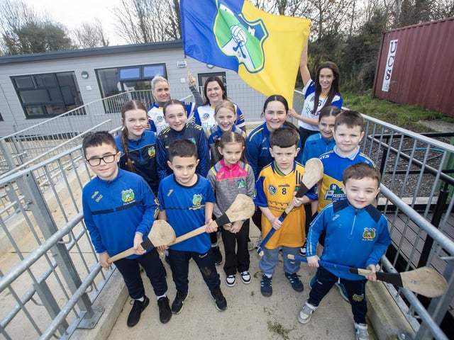 Pupils and staff from St. Aengus'' National School, Bridgend showing their support for the Beart GAC hurlers who will take on Lavey in the Ulster Junior Championship final at Celtic Park on Saturday. (Photos: Jim McCafferty Photography)