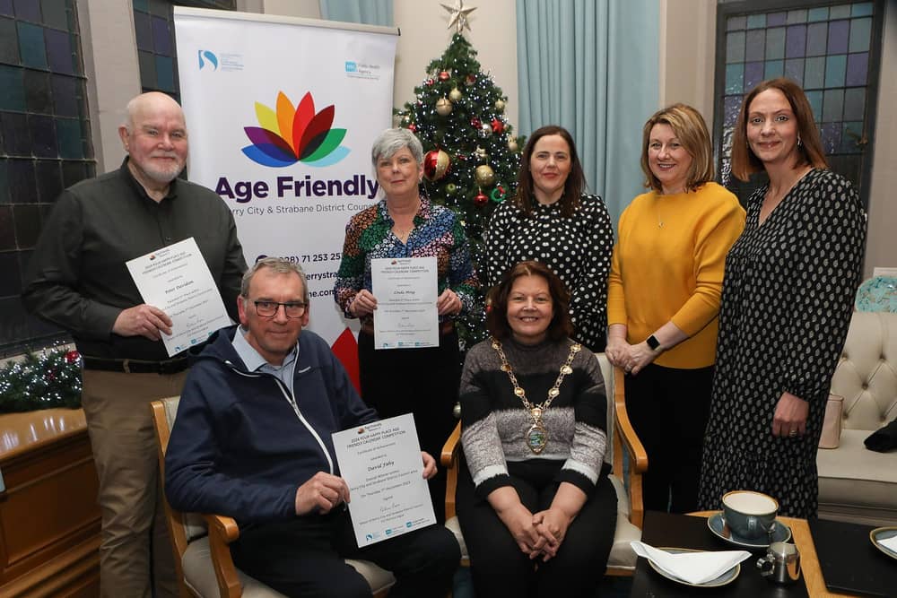 Mayor Patricia Logue with prizewinners in the Age Friendly "Your Happy Place" competition, at a reception held in the Mayor's Parlour. Seated is David Fahy, winner. Standing, from left, are Peter Davidson, 2nd place, Linga Ming, 3rd place, Ciara Burke, Age Friendly co-ordinator, Sonia Montgomery, WHSCT, and Heather Hamilton, Public Health Agency. (Photo - Tom Heaney, nwpresspics)