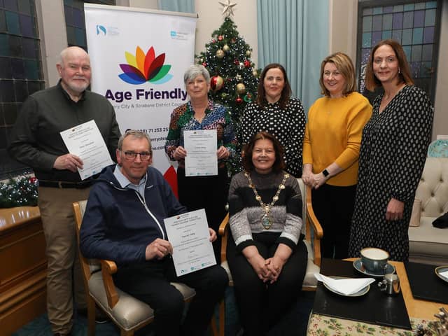 Mayor Patricia Logue with prizewinners in the Age Friendly "Your Happy Place" competition, at a reception held in the Mayor's Parlour. Seated is David Fahy, winner. Standing, from left, are Peter Davidson, 2nd place, Linga Ming, 3rd place, Ciara Burke, Age Friendly co-ordinator, Sonia Montgomery, WHSCT, and Heather Hamilton, Public Health Agency. (Photo - Tom Heaney, nwpresspics)