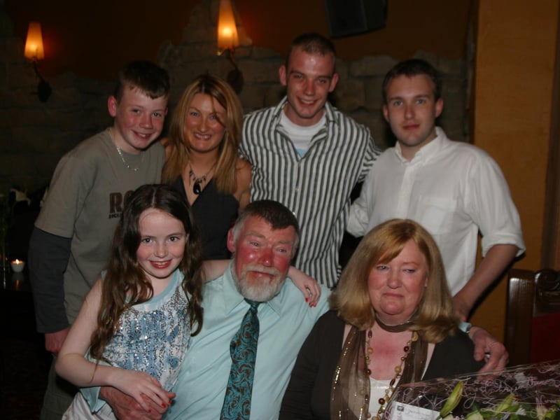 Hugh and Eileen with their grandchildren at their 50 th Wedding Anniversary party. 2956/dd : .