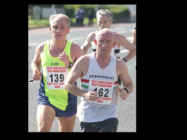 Shoulder to shoulder are Joe Mathers (139) and Gerard McClenaghan (162). (1609T37).:.