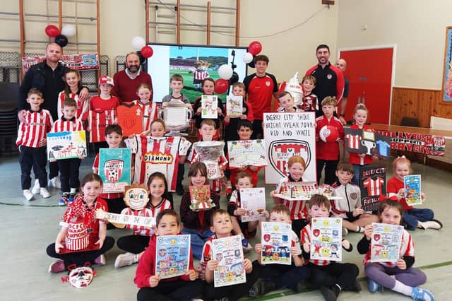 DERRY CITY VISIT. . . .Some of the art prizewinners pictured during Derry City's visit to Hollybush Primary School on Friday.