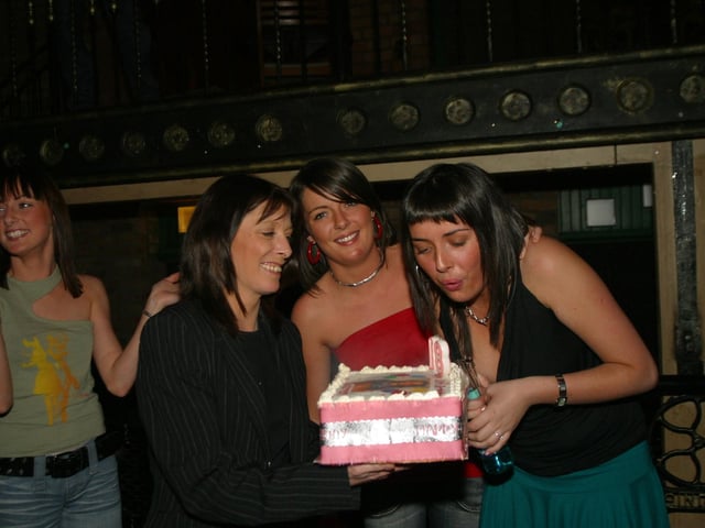Karen O'Doherty blowing out the candles.