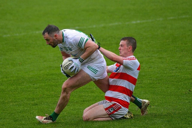 Craigbane’s Lee Moore evades a tackle from Callum Bradley of Ballerin during the JFC Final in Celtic Park on Sunday afternoon last. Photo: George Sweeney.  DER2241GS – 36