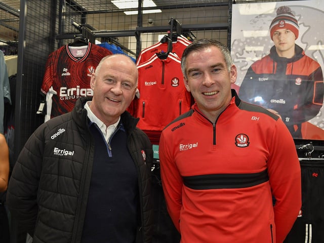 Derry GAA treasurer Martin Devlin and senior football coach Benny Heron pictured at the launch of Derry’s new home and away jersey, for the 2026/2027 season, at O’Neill’s sports store in Waterloo Place on Thursday evening. Photo: George Sweeney