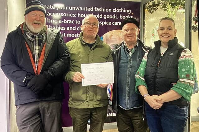 Cromore Beatles presenting proceeds of funds raised to Northern Ireland Children’s Hospice.