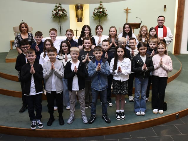 Mrs Deane's P7 class at Sacred Heart Primary School who received the Sacrament of Confirmation from Fr. Patrick Lagan at Sacred Heart Church, Waterside on Saturday last. Included is Mrs. Louise Cunning, Principal, (Photos: Jim McCafferty Photography)