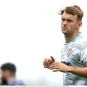 Jamie Stott of Derry City warms up before his debut in Tallaght.