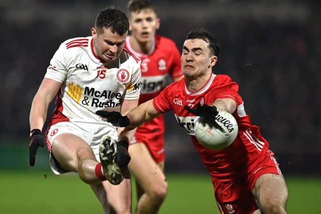 Ethan Jordan of Tyrone has his shot blocked down by Diarmuid Baker of Derry during the Allianz Football League Division 2 match between Derry and Tyrone at Celtic Park in Derry. Photo by Oliver McVeigh/Sportsfile